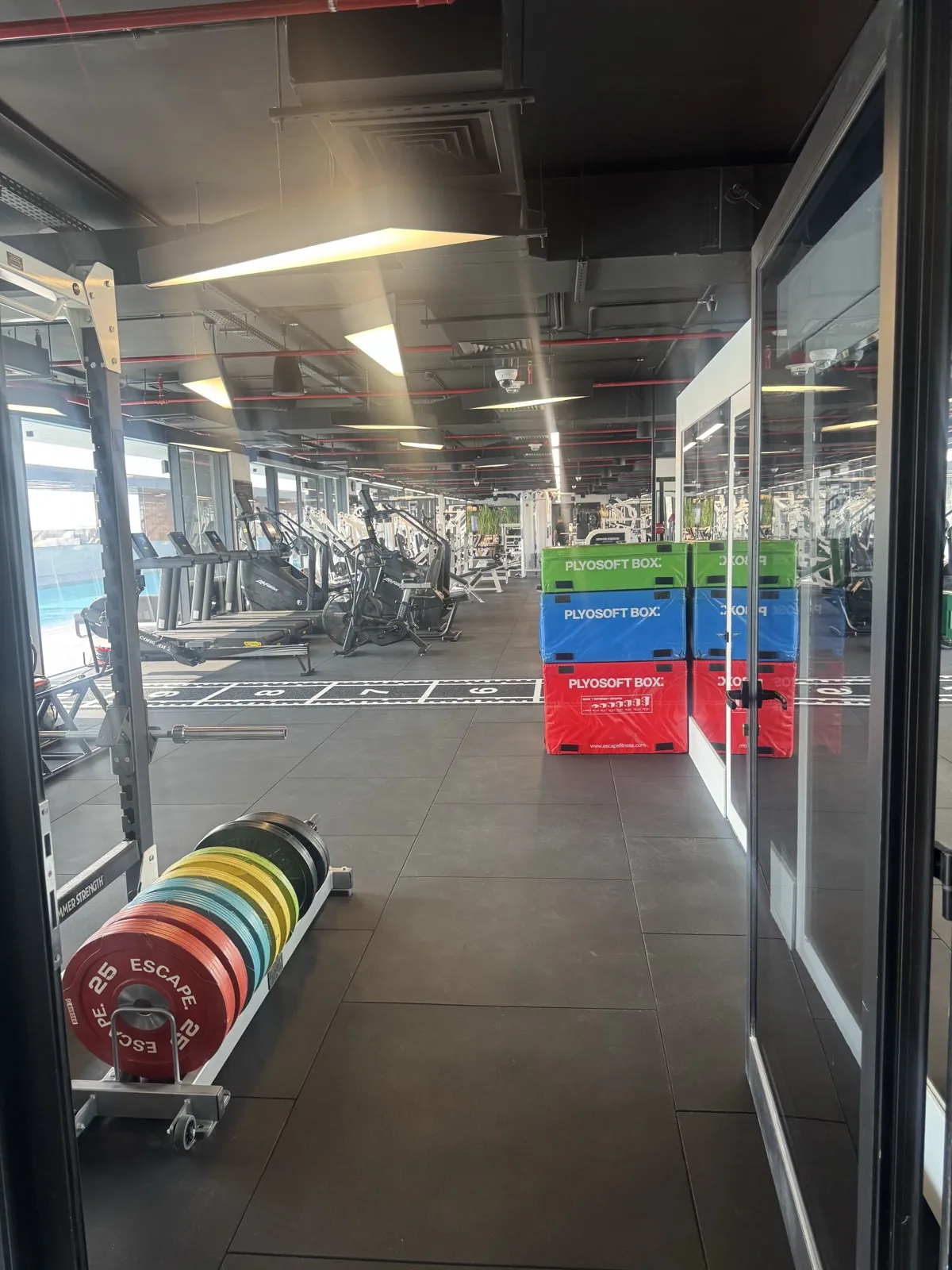Functional training area with plyometric boxes and plates