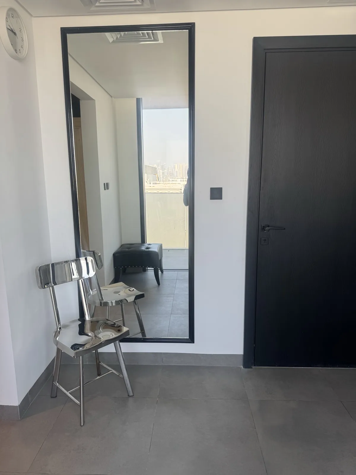 Mirror and dark door in the changing area