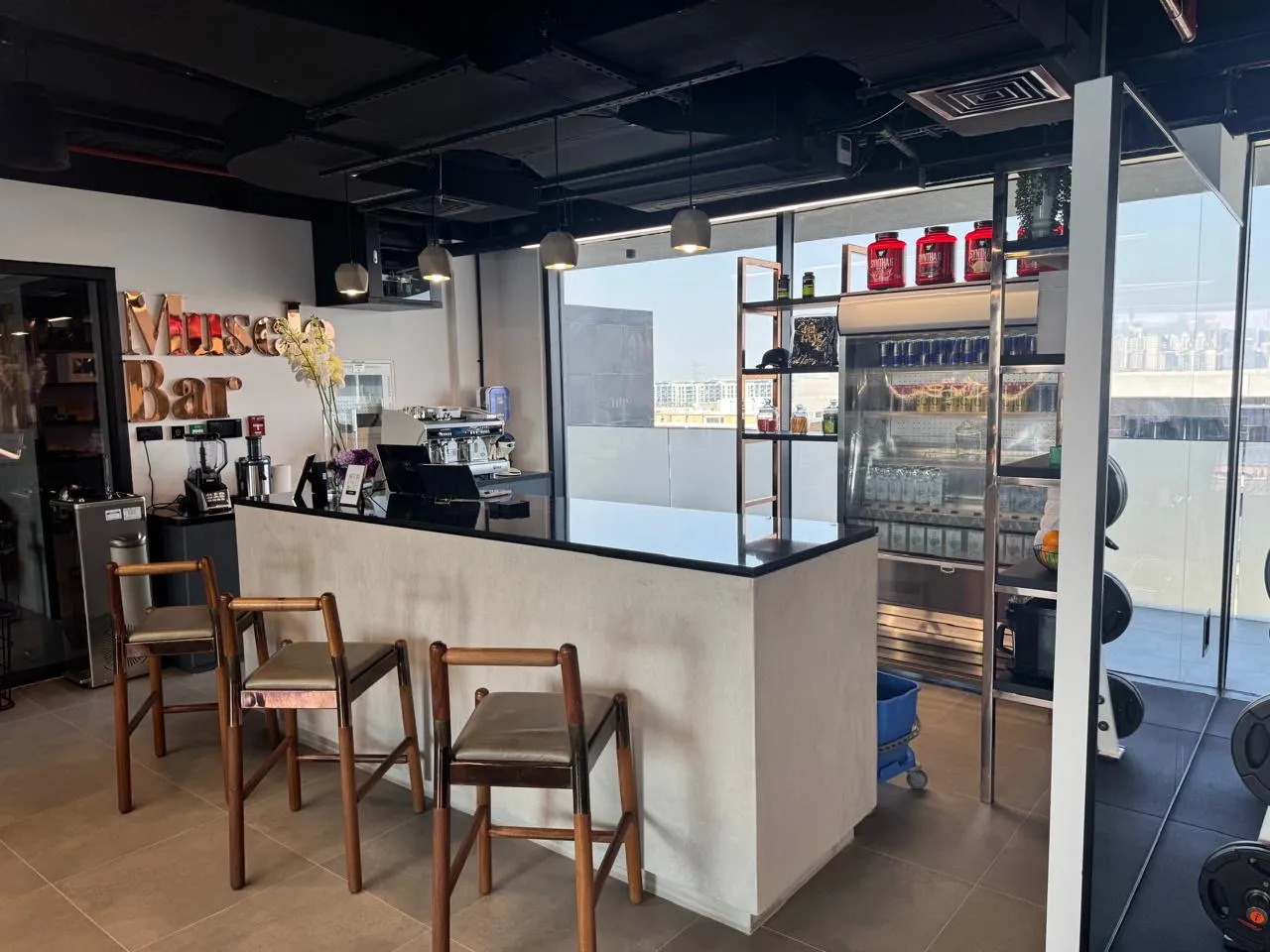 Bar counter with fresh flowers and coffee