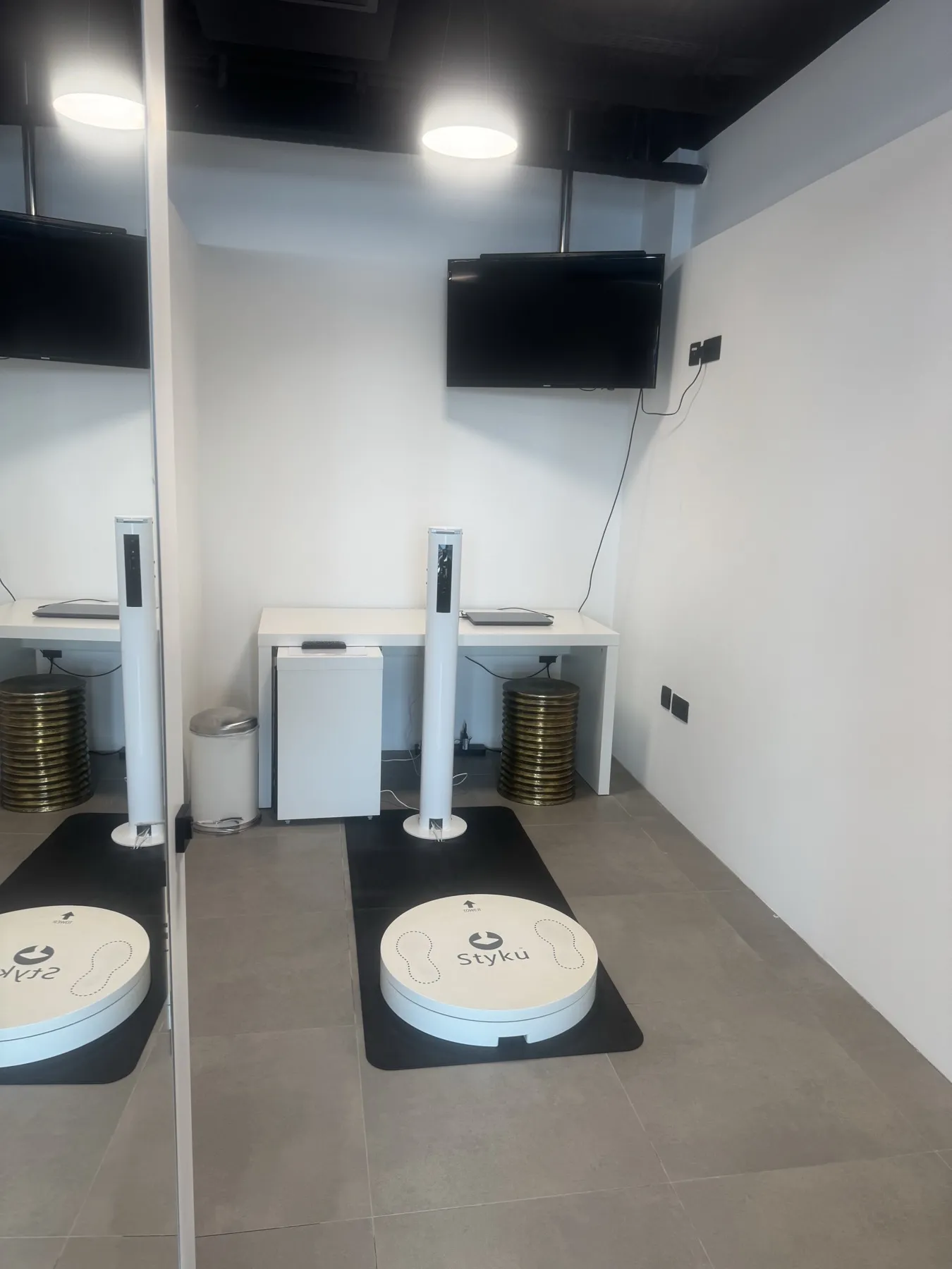 Styku 3D body scanner turntable in its private scanning room